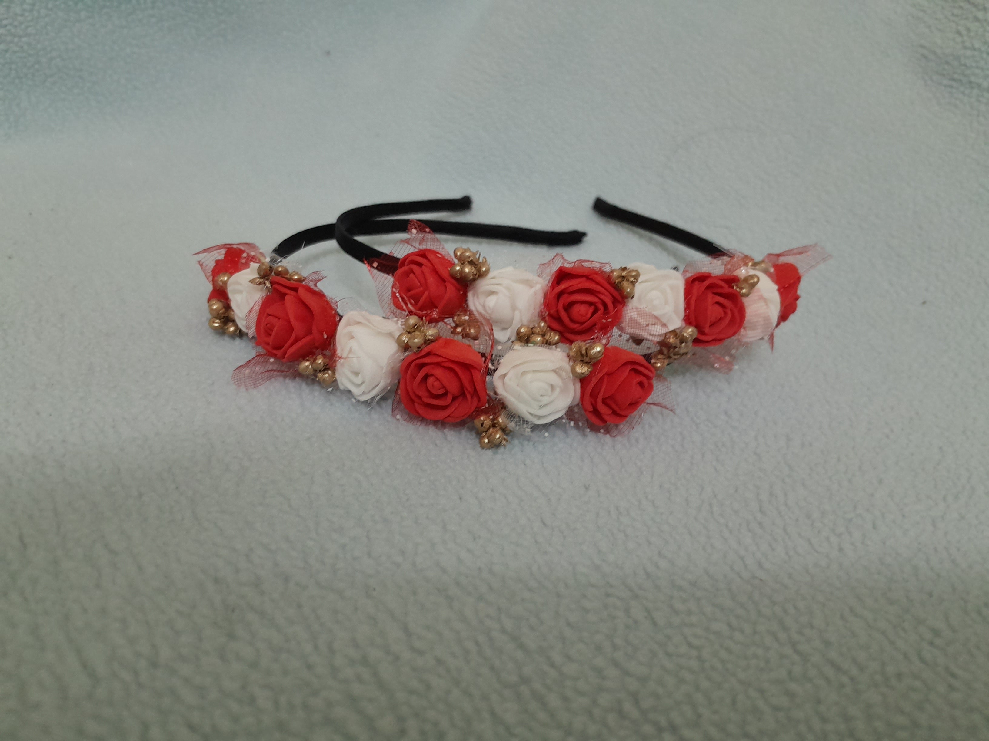 Floral headband with red and white flowers
