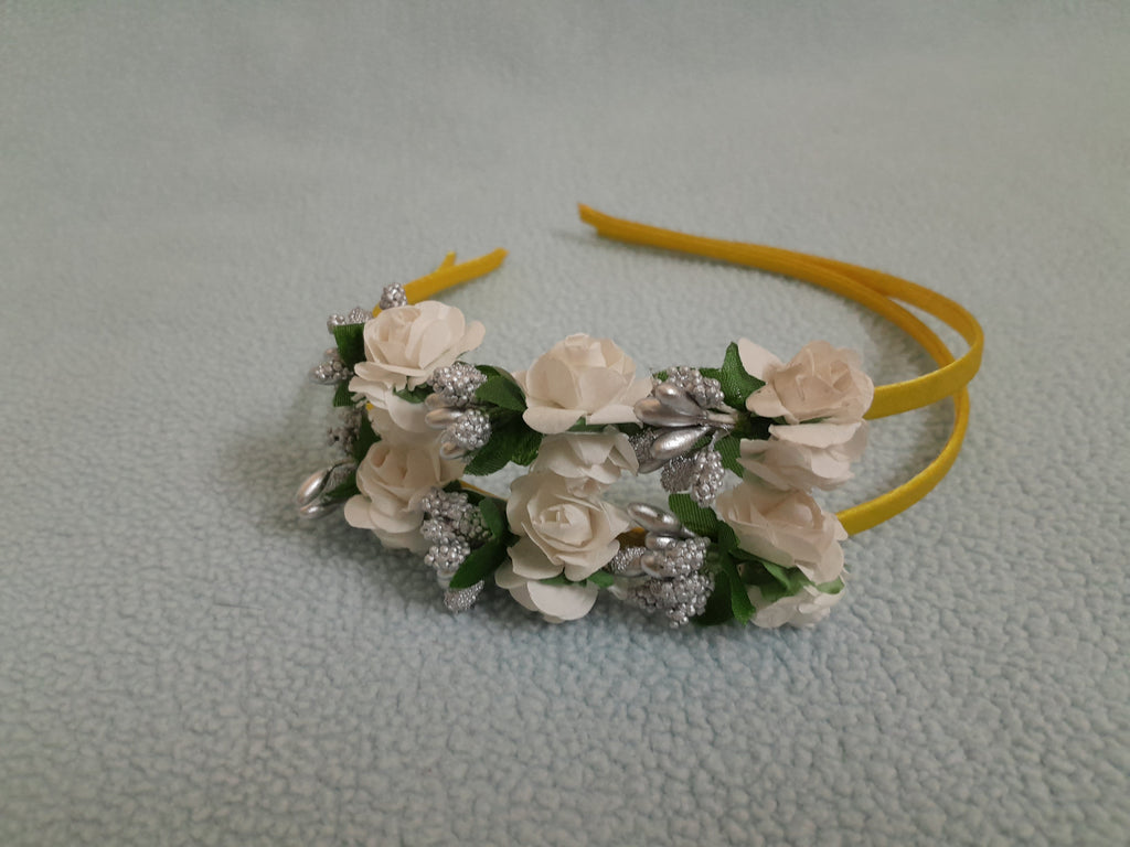 Floral headband with white flowers and yellow headband 