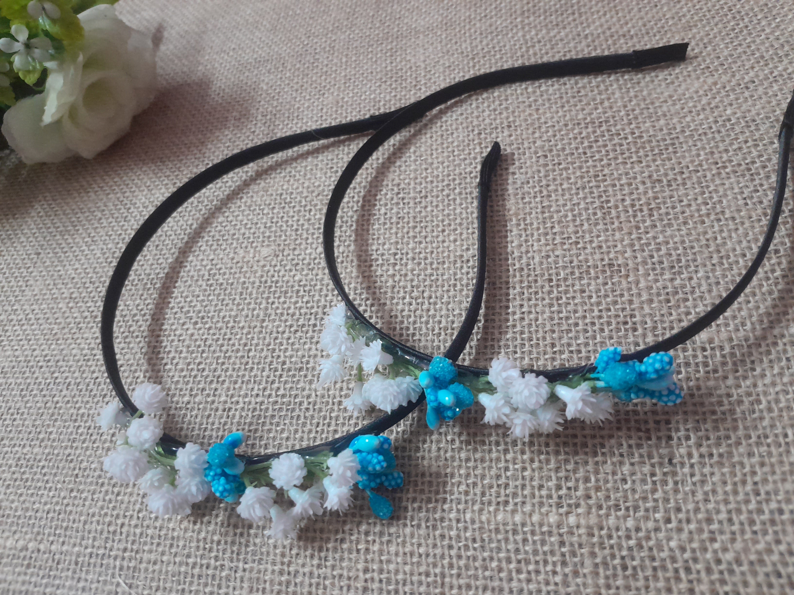 Floral headband with blue and white flowers 